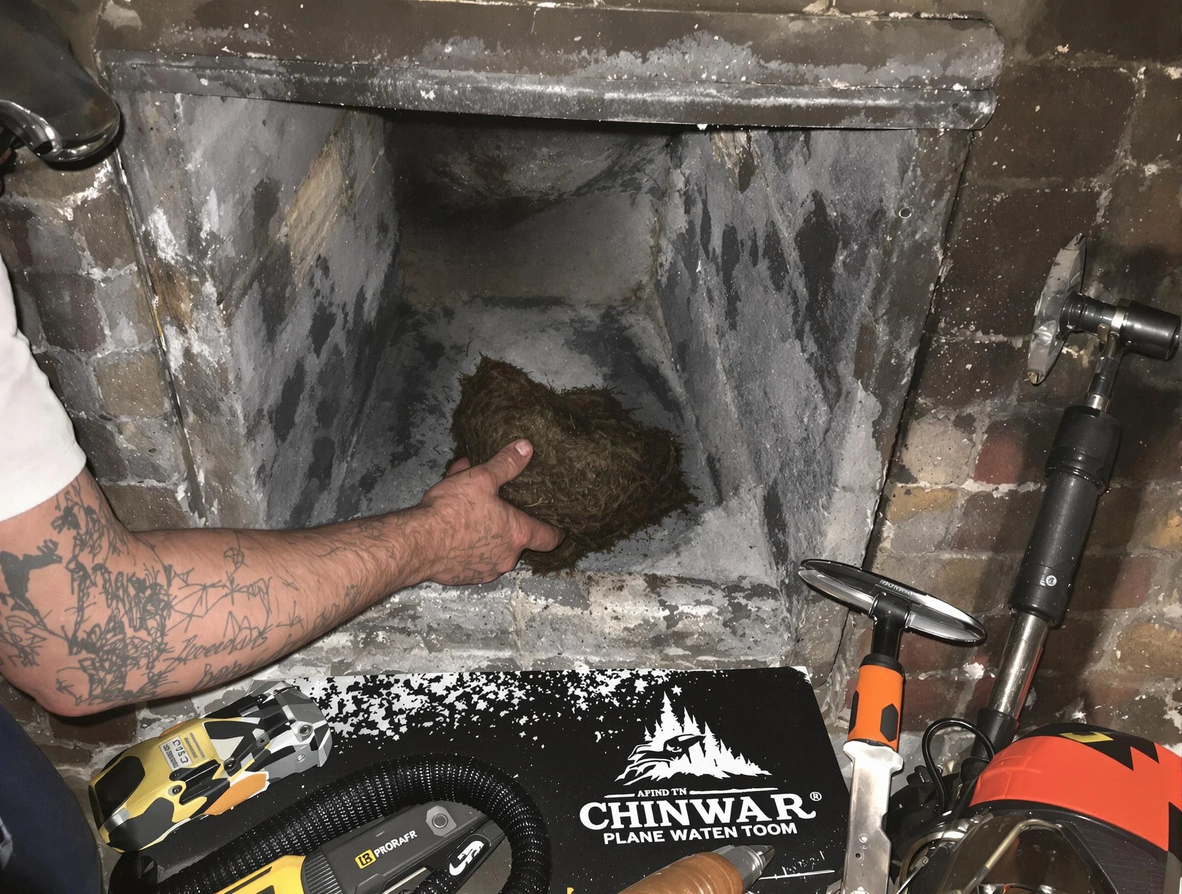 Scotch Plains Chimney Sweep safely removing debris and screening chimney in Scotch Plains, NJ